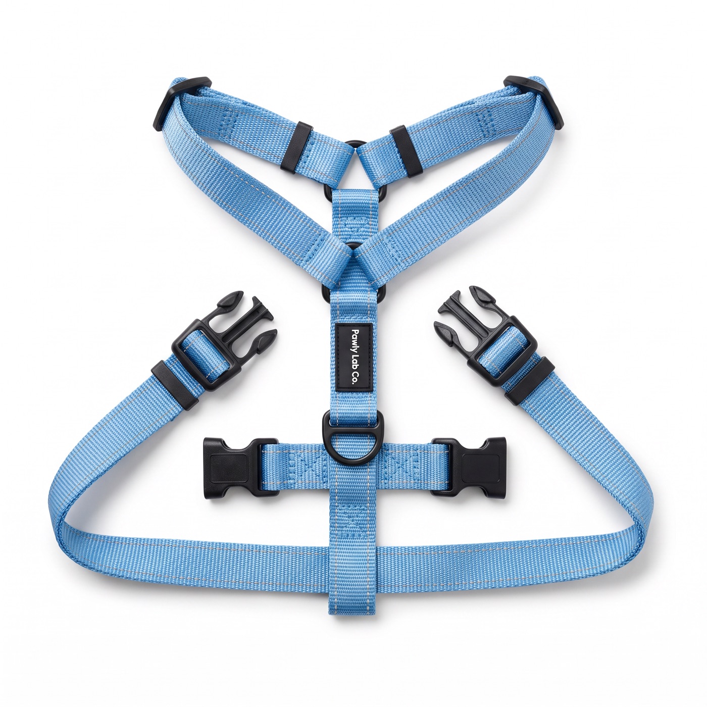 The PawlyLabs No-Pull Harness laid flat, showing the front chest clip D-ring and Y-strap panel